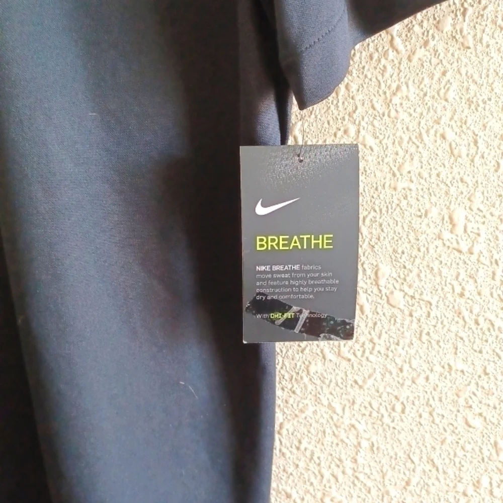 NIKE Breathe Polo Shirt.